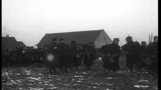 Russian troops moving through a village on Western Front during World War One HD Stock Footage