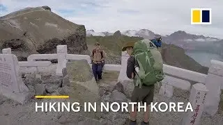 Hiking in North Korea: Foreign tourists hike on Mount Paektu volcano for first time