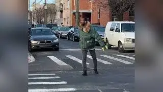 Watch: Staten Island Man uplifts spirits by directing traffic