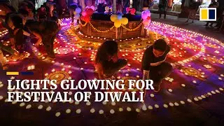 Diwali candles glow as Hindu festival of light celebrations begin after year of Covid-19 darkness