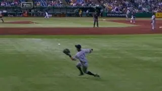 Ichiro slides for a game-saving grab in right