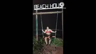 Swinging on a Swing in the beach