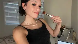 girly pop doing makeup