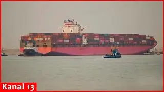 Tugboats rescue ship in Suez Canal after it suffers fault