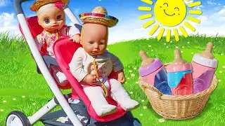 Baby Annabell doll and Baby Alive doll go on a picnic. Feeding baby dolls with toy food. Kids video.