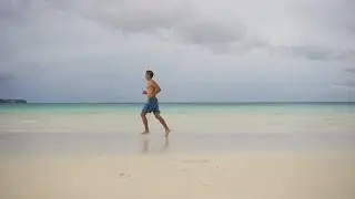 Man Running On The Beach Stock Video