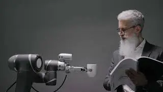 Robot Handing a Coffee to an Elderly Man