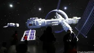 Shenzhou-12 carrying three astronauts docks with Tiangong space station