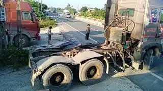 A crane truck takes the damaged car box off the pedestal for repair