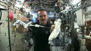 Wet Washcloth In Space - What Happens When You Wring It? | Video