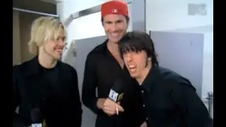 Chad Smith, Dave Grohl and Taylor Hawkins in 2000