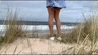 Crossdressing on the beach.