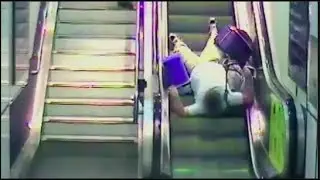 People Falling Down Escalators