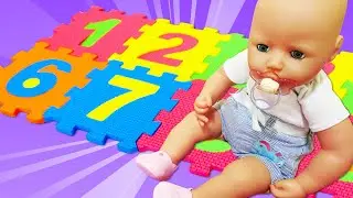 Baby Annabell doll plays with a big number puzzle for kids. Baby dolls videos for kids. Kids fun.