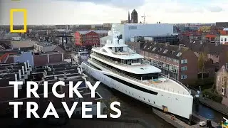 Huge Yacht Manoeuvres Through Narrow Canals | Europe From Above | National Geographic UK