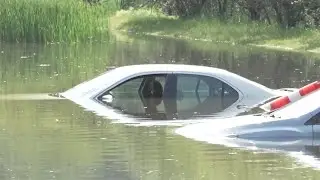 WATCH: Cars underwater after storm causes flooding in East Lansing