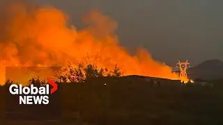 Arizona wildfire prompts evacuations near Scottsdale as firefighters struggle to contain it