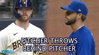 Cubs Pitcher throws behind Brewers Pitcher, a breakdown