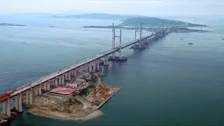 Wind barriers being installed on worlds longest cross-sea road-rail bridge