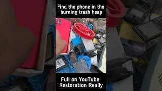 Find the phone in the burning trash heap