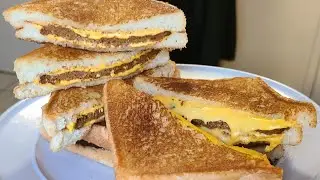 Hot Sausage stuffed Grilled Cheese Sandwiches | Grilled cheese sandwiches with a New Orleans twist.