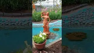 relaxing waterfall statue artistic architectural design kerala