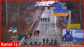 Ukrainian border guards cross Belarus border, plant their flag on Belarusian territory