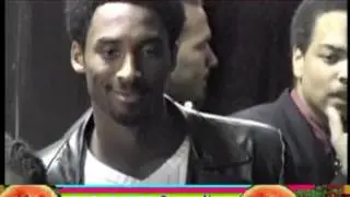 KOBE BRYANT poses with his sisters, speaks Italian to reporters
