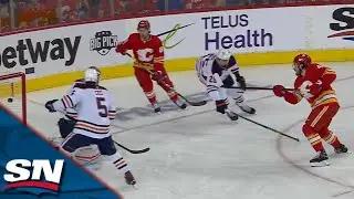 Johnny Gaudreau Finds A Wide Open Rasmus Andersson Who Fires It Past Mikko Koskinen