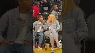 Adele sitting courtside at a Lakers game