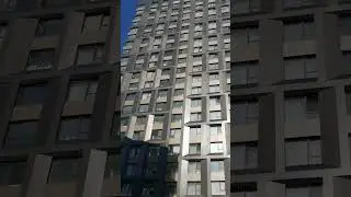 Красивый фасад современного жилого многоквартирного дома в районе метро Спартак Short 