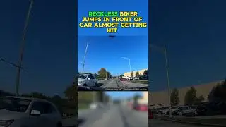 Reckless biker jumps in front of car and almost gets hit #youtubeshorts #driving #shorts #smartphone