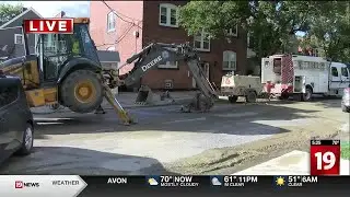 Road buckles after water main break near Little Italy