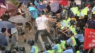 Clashes at Hong Kong pro-democracy protest, leader promises more talks