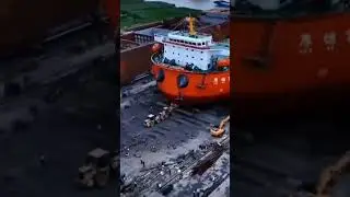 Two excavators brake huge ship #excavator #ship #tanker #port #dry #service #reconstruction