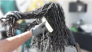 CUTTING OFF HIS LOCS | FIRST HAIRCUT IN 7YEARS | EPIC TRANSFORMATION