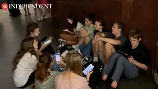 Kyiv residents sing city's anthem while sheltering in subway during rocket attack