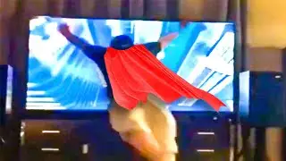 Superman jumps into the TV while playing VR