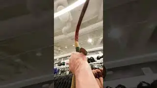 First person shooter, archery in a shop