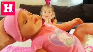 Распаковка куклы Бэби Борн и переноски-кенгуру. Baby born doll. Беби бон с аксессуарами видео.