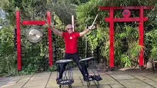 Taiko drumming at home in the back garden.