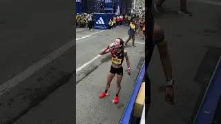 Emma Bates Cracks a Beer at Boston Marathon