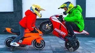 Как разрешить СПОР???Dania and Tisha ride on children's motorcycle and stuck in the ground .