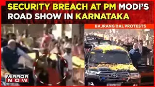 Security Breach At PM Modis Road Show In Karnataka, 10-Year-Old Boy Jumps Barrier To Garland PM