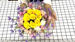 Artistic flower arrangement with a combination of many types of flowers