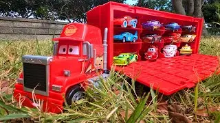 24 kinds of Disney Cars Tomica & Big Mac trailer storage series