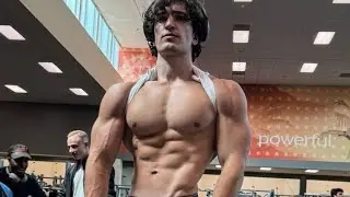 Young Guy flexing muscles