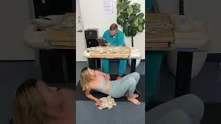 Woman was being flexible with her toes to take money from nurse 