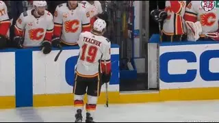 Matthew Tkachuk injured and leaves ice after sandwich hit with Benn and Oleksiak