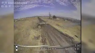 FPV дрон-камикадзе атакует БМП противника.